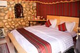 Sama Al Wasil Desert Camp - Schlafzimmer Sultan Zelt